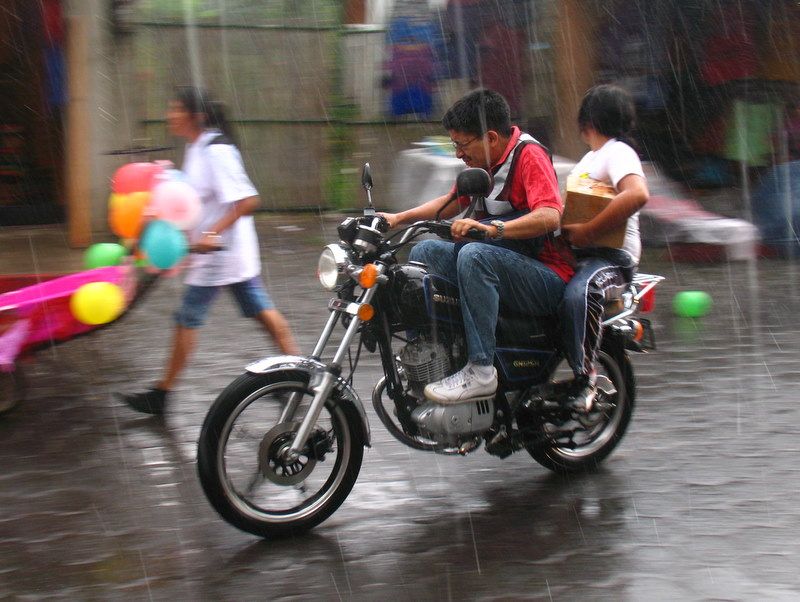 motorcycle riding in rain